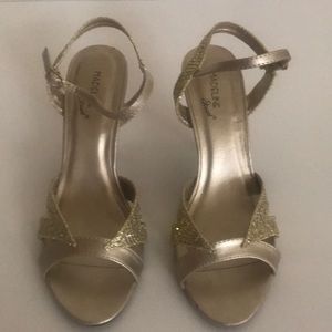Women’s Madeline Stuart gold heels size 8.5